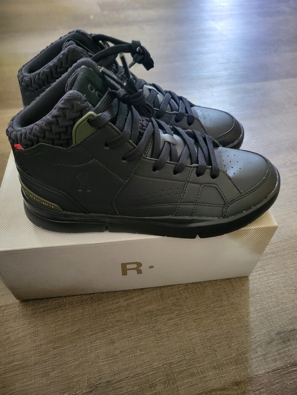 On Running Black High-Top Athletic Shoes with Olive Accents